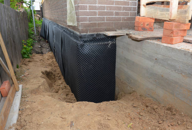 Happy homeowners after waterproofing job in Canandaigua